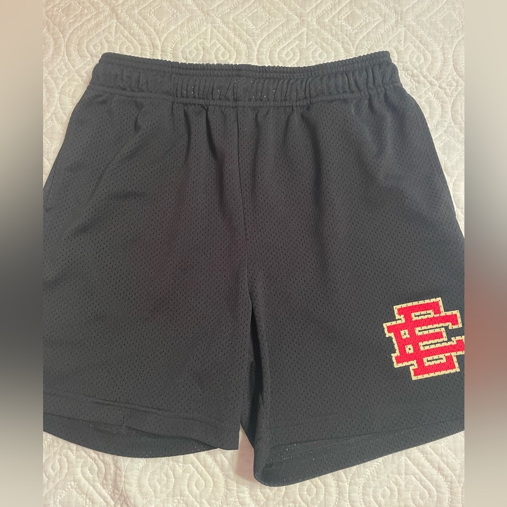 Eric Emanuel men’s black mesh shorts with red logo